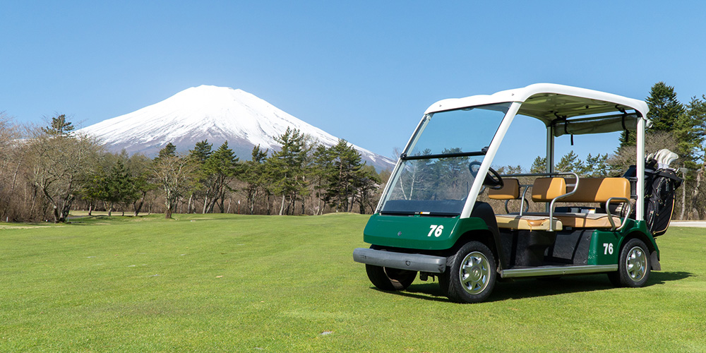 A riding cart on the fairway at Fuji Golf Course, with Mt. Fuji behind